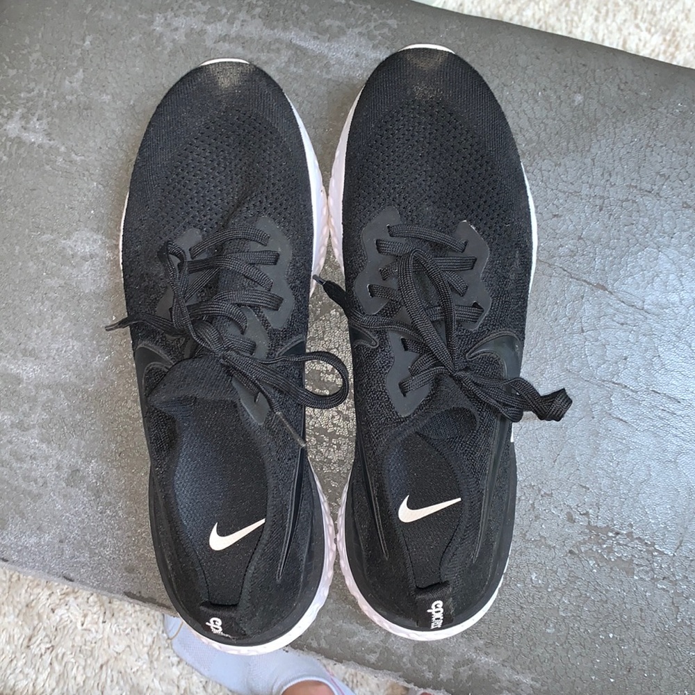 TWO pairs of Nike men’s running sneakers